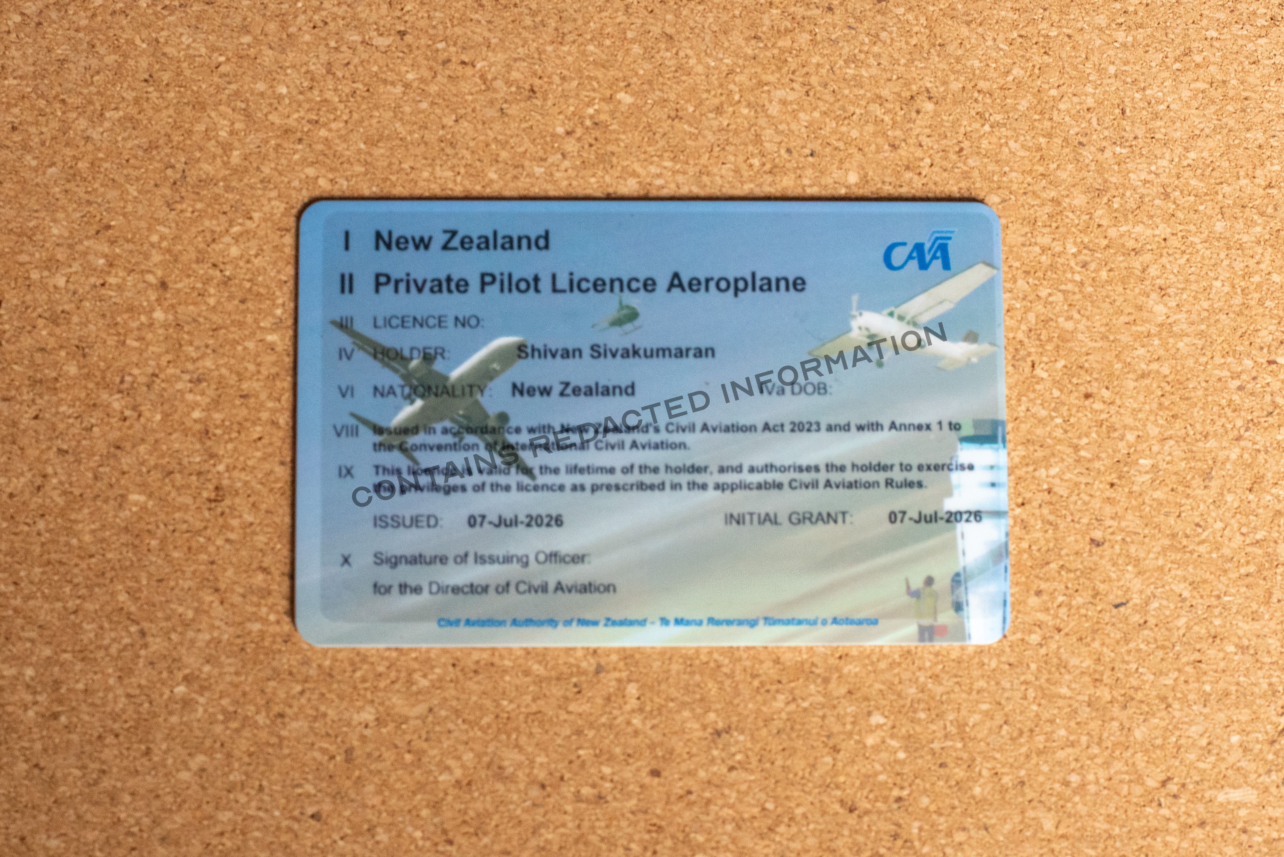 A license for a private pilot with certain parts redacted
